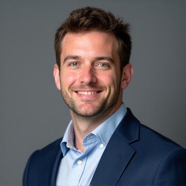 Professional headshot of Ben Carter.
